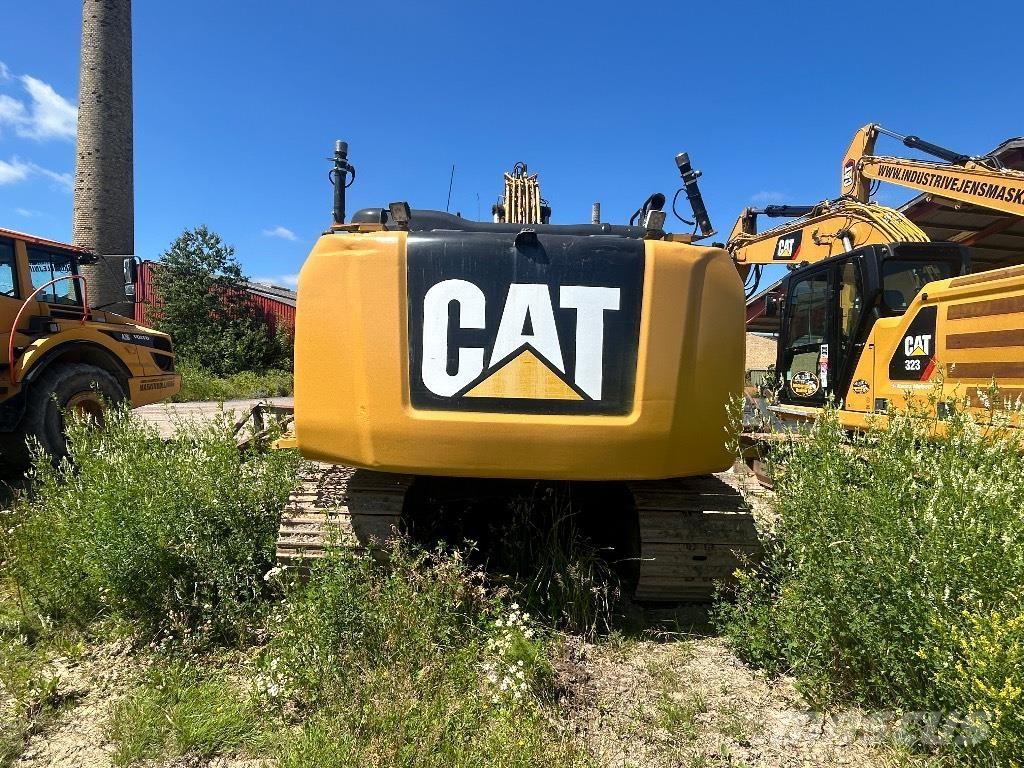 CAT 323 EL Гусеничні екскаватори