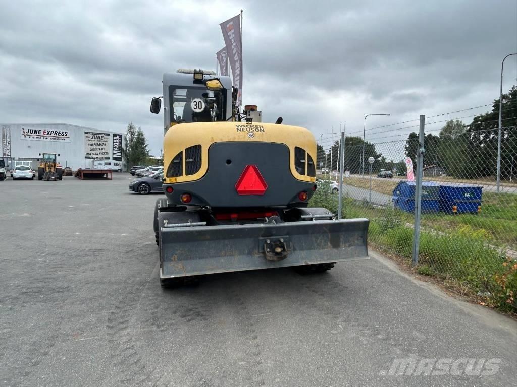 Wacker Neuson EW100 Колісні екскаватори