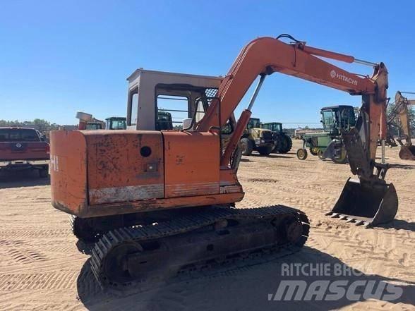 Hitachi EX 60 Гусеничні екскаватори
