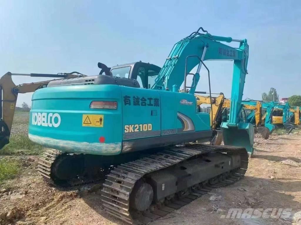 Kobelco SK 210 D Гусеничні екскаватори