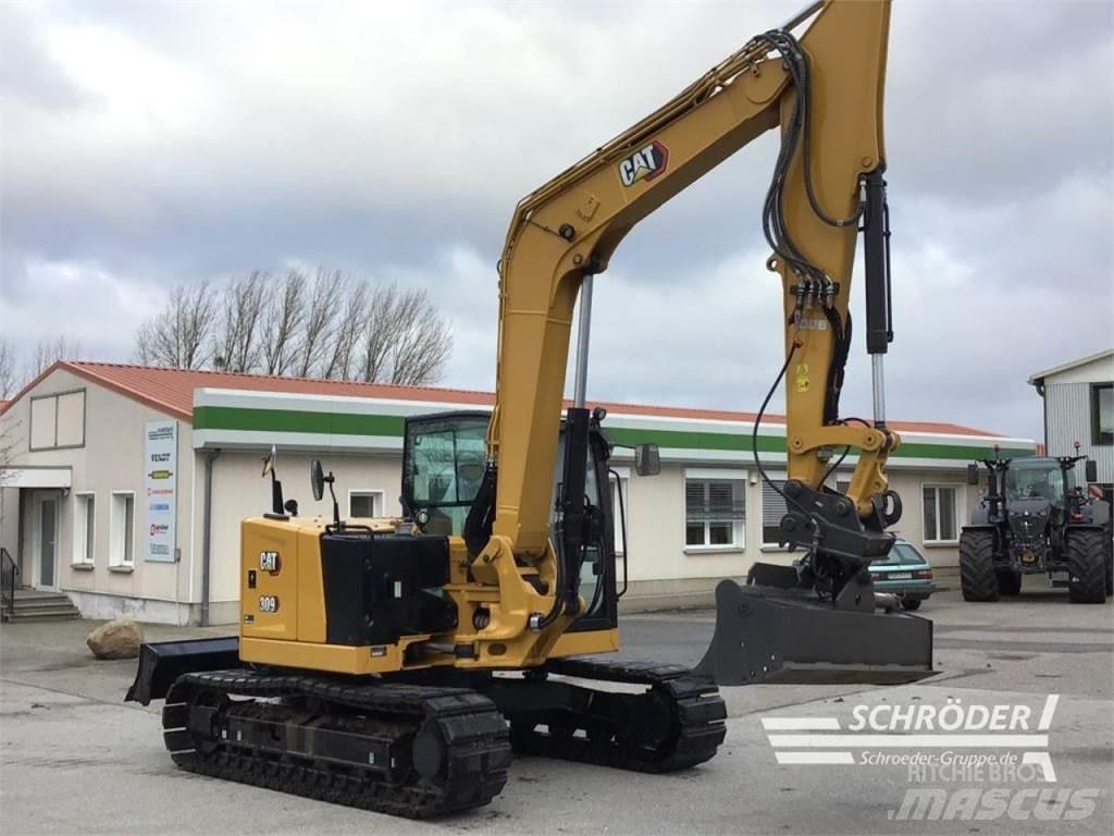 CAT 309 CR Колісні екскаватори