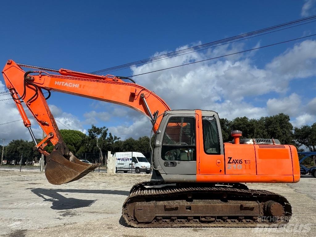 Hitachi ZX 210 Гусеничні екскаватори