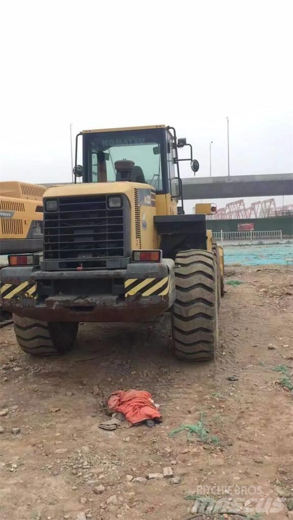 Komatsu WA320-5 Екскаватори-навантажувачі