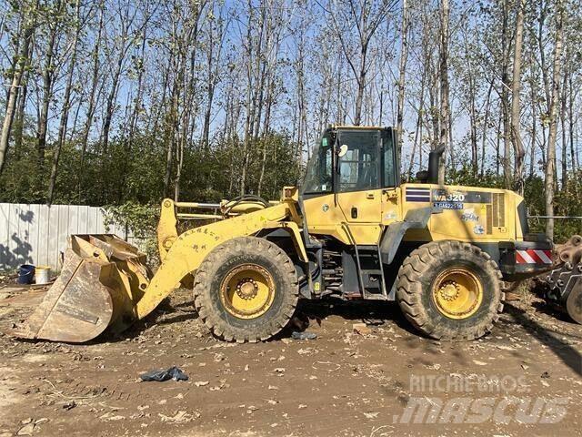 Komatsu WA320-5 Екскаватори-навантажувачі