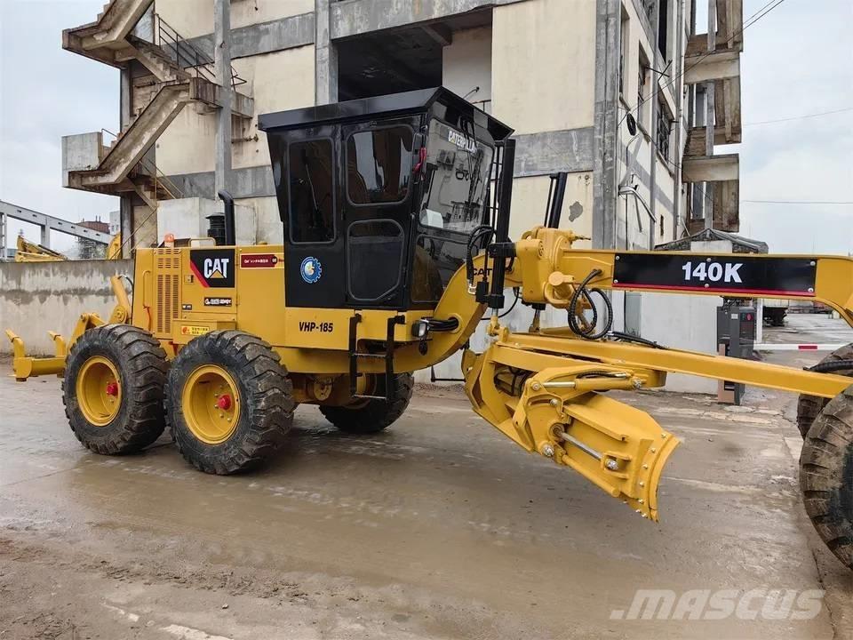 CAT 140K Грейдери