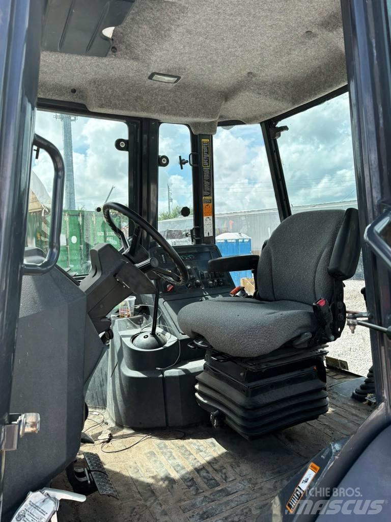 DEERE 310L EP Екскаватори-навантажувачі
