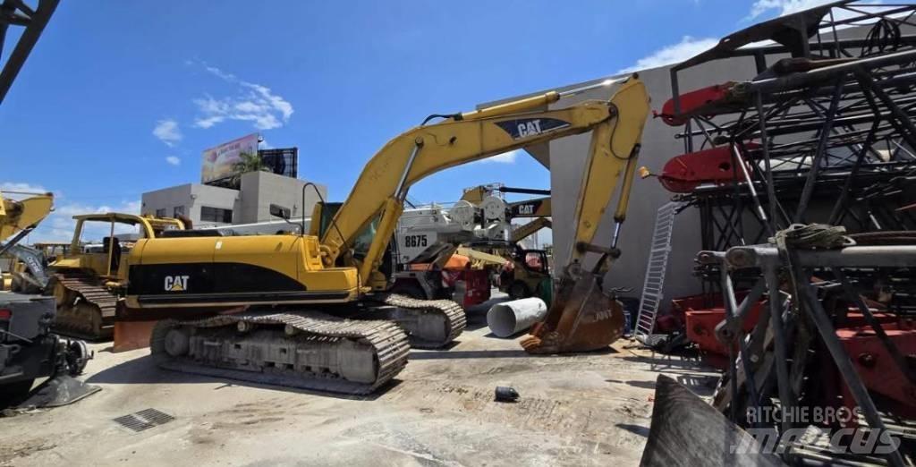CAT 325 CL Гусеничні екскаватори