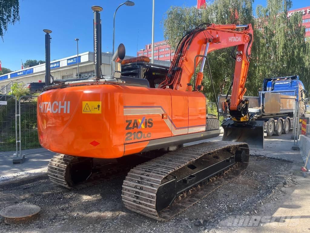 Hitachi ZX 210 Гусеничні екскаватори