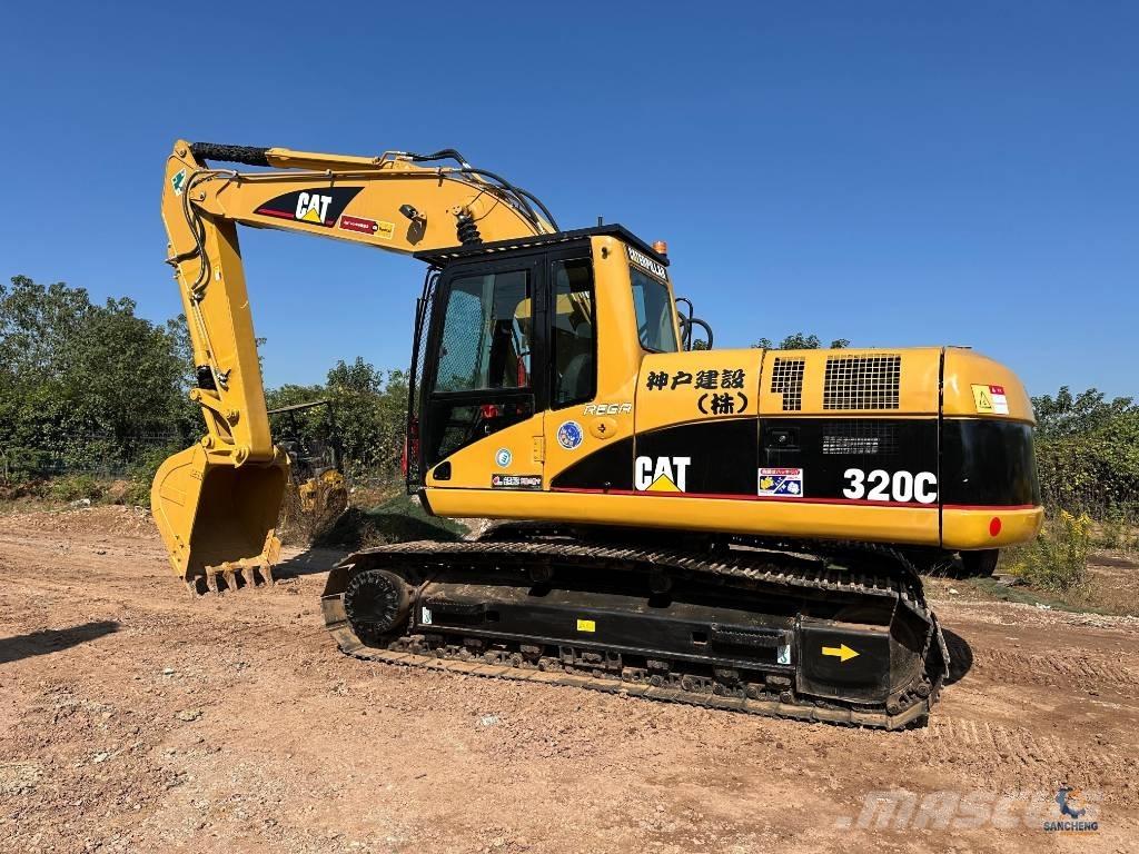 CAT 320 C Гусеничні екскаватори