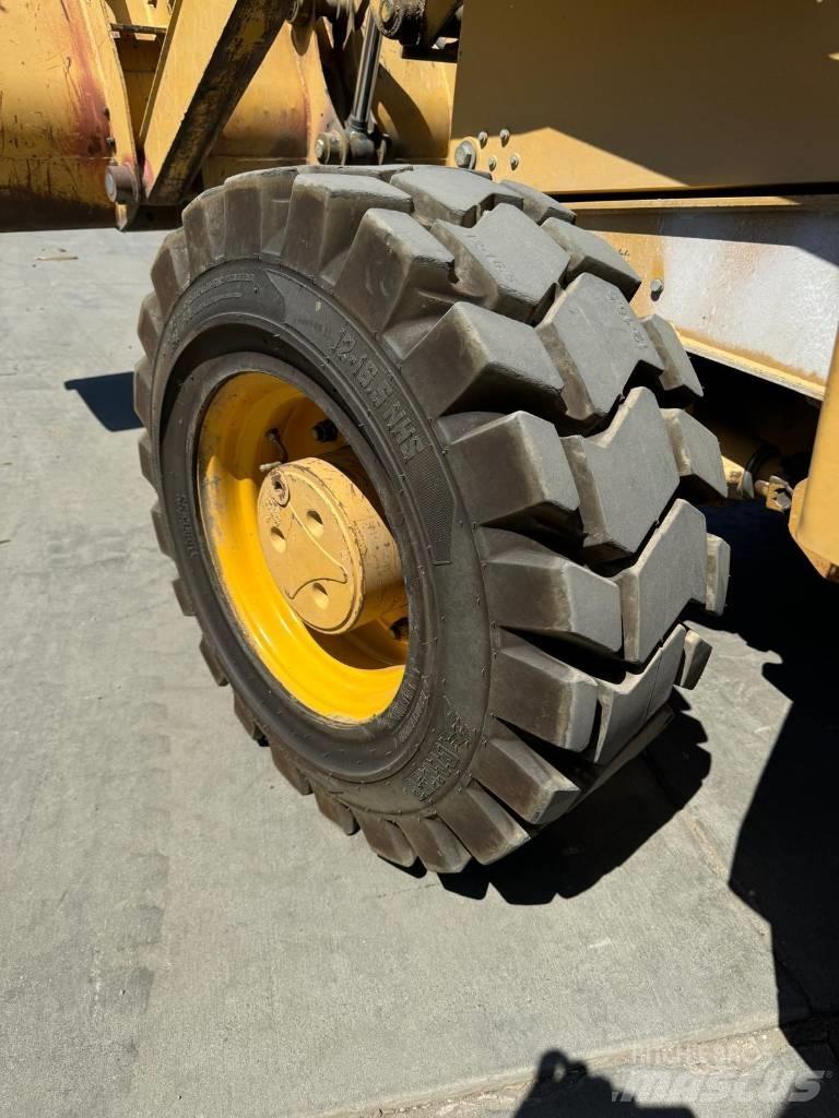 John Deere 310 G Екскаватори-навантажувачі