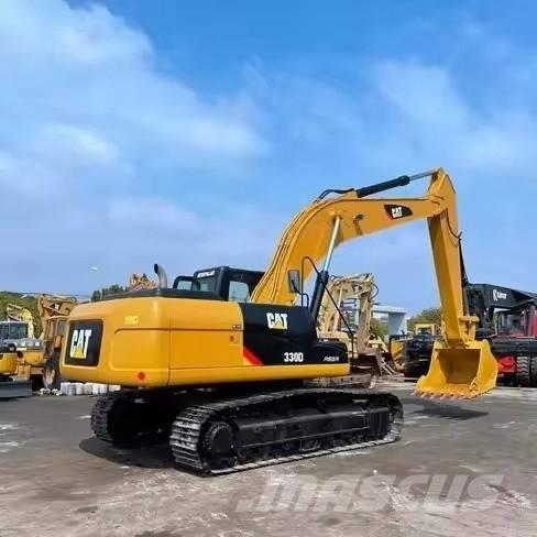 CAT 330 Гусеничні екскаватори