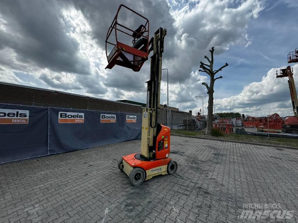 JLG T08E Вертикальні щоглові підйомники