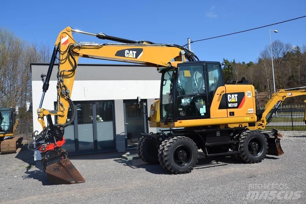 CAT M 315 F Колісні екскаватори