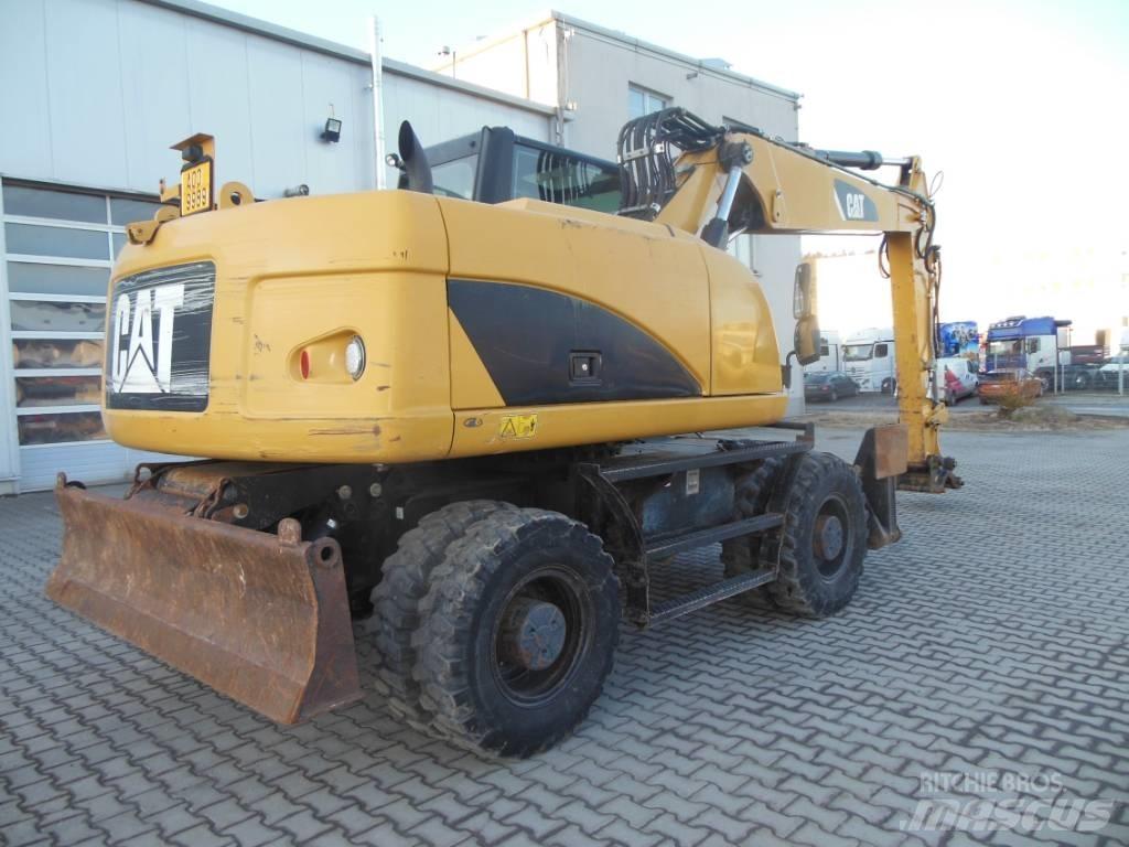CAT M 316 D Колісні екскаватори