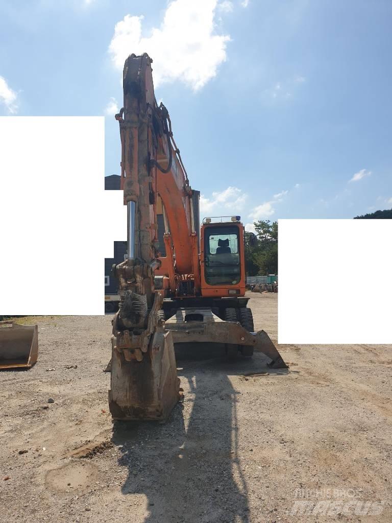 Doosan DX210WA Колісні екскаватори