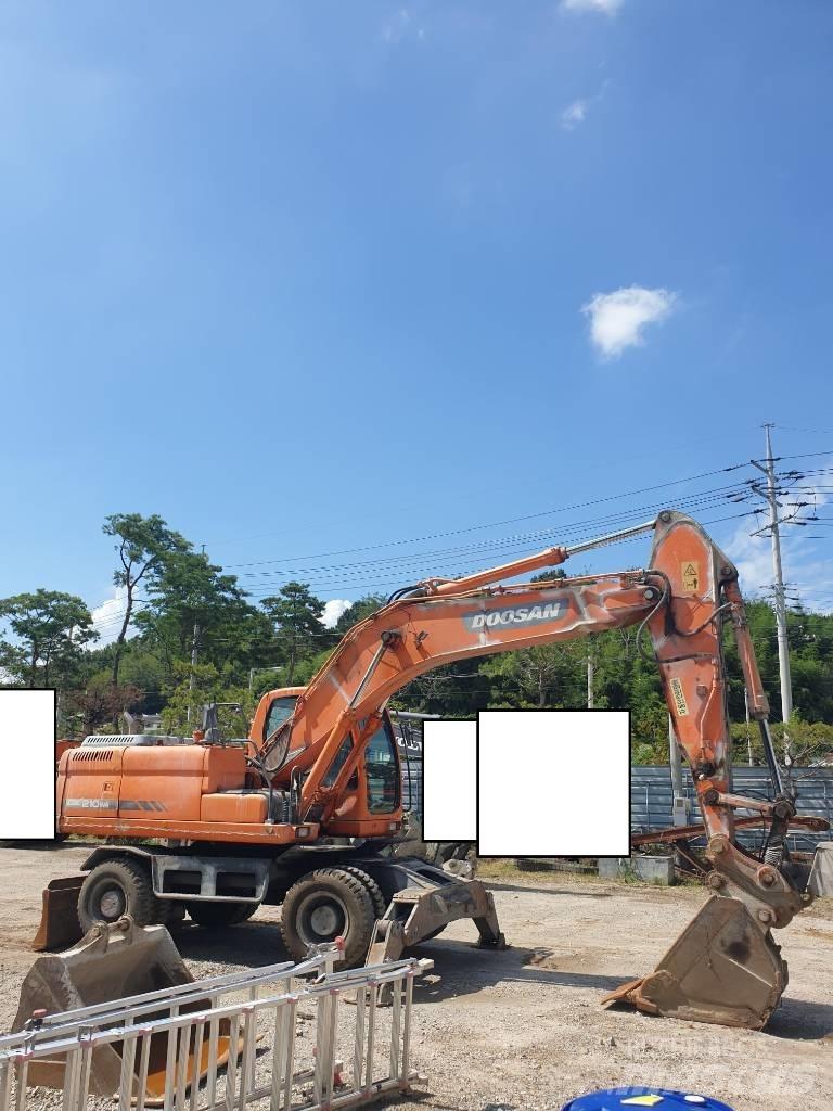 Doosan DX210WA Колісні екскаватори