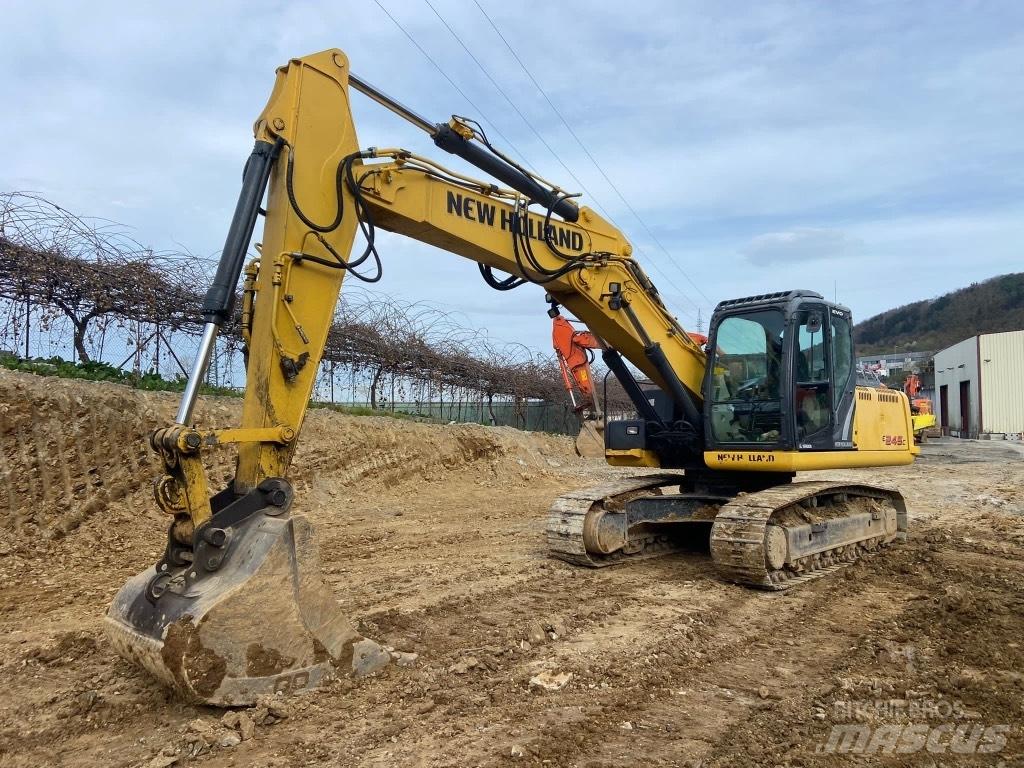 New Holland E245 Гусеничні екскаватори