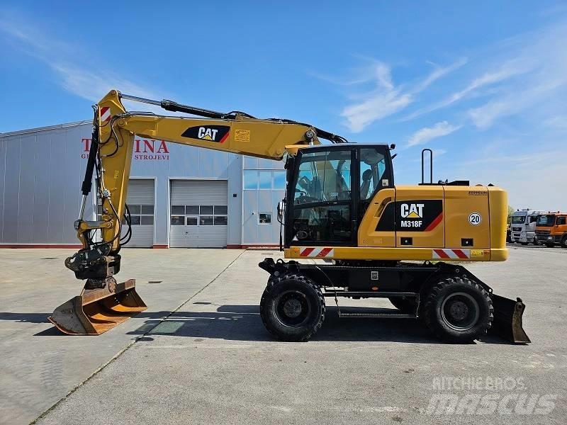CAT M 318 F Колісні екскаватори