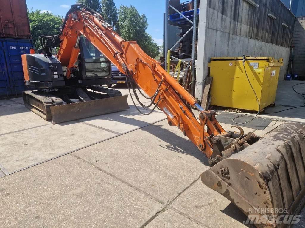 Hitachi ZX85US-5A Середні екскаватори 7т. - 12т.