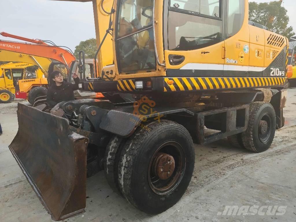 Hyundai 210W-9 Колісні екскаватори