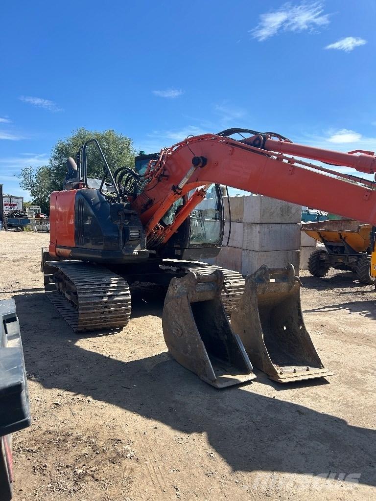 Hitachi ZX 135 US-6 Гусеничні екскаватори