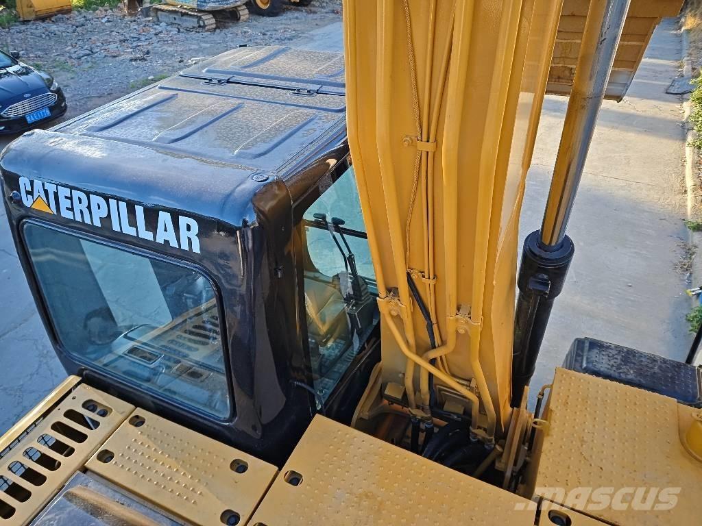 CAT 312 D Гусеничні екскаватори