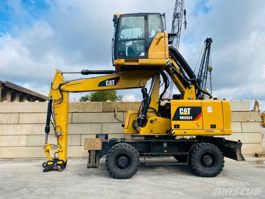 CAT mh3024 Колісні екскаватори