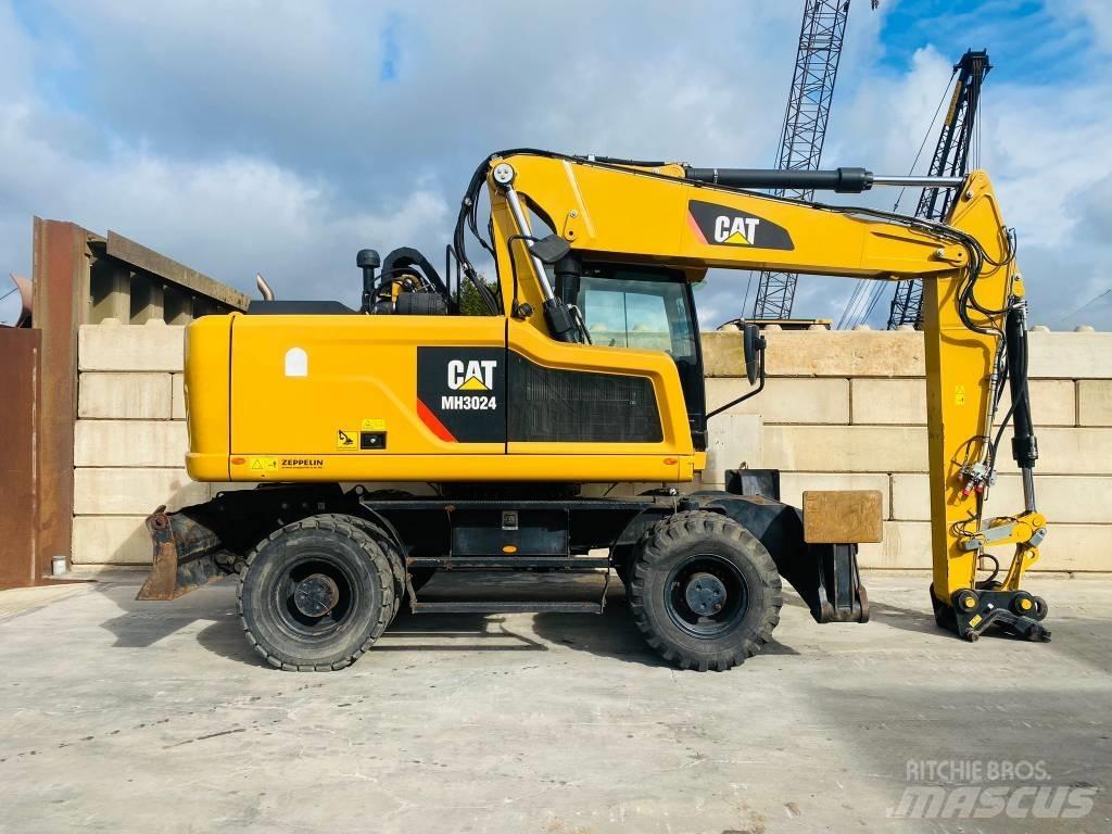 CAT mh3024 Колісні екскаватори
