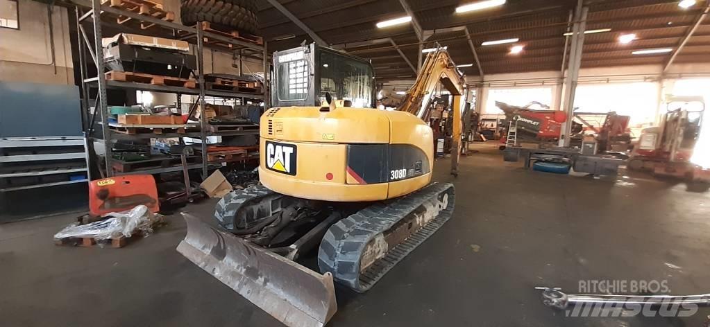 CAT 308 Середні екскаватори 7т. - 12т.