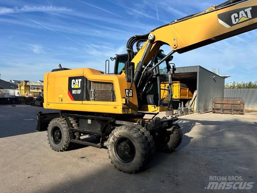 CAT M 318 F Колісні екскаватори