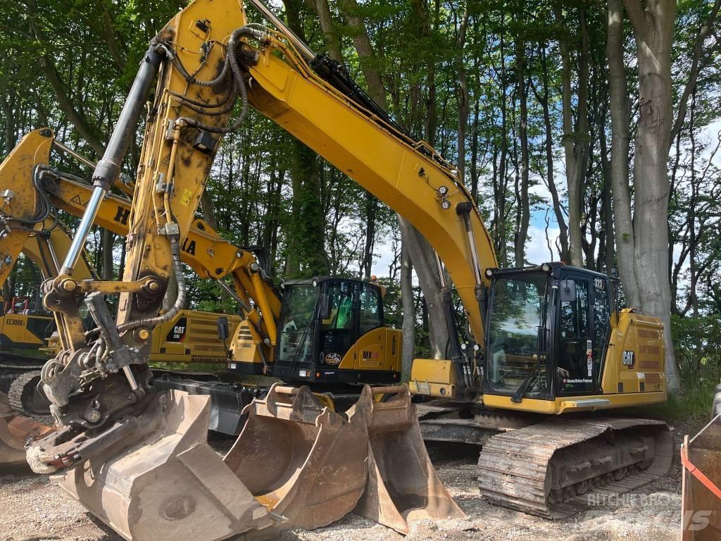 CAT 323 Гусеничні екскаватори