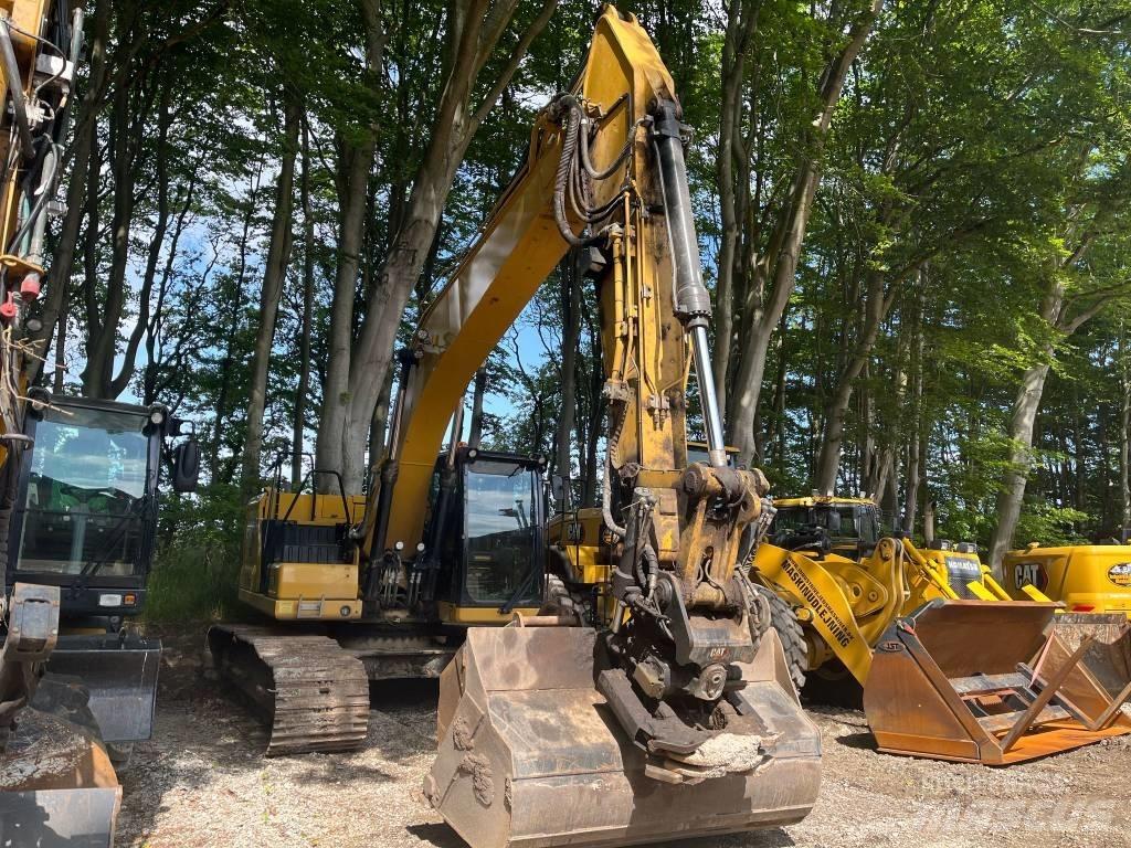 CAT 323 Гусеничні екскаватори