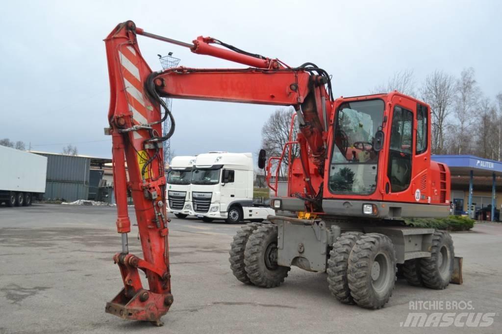 Komatsu PW 148-8 Колісні екскаватори