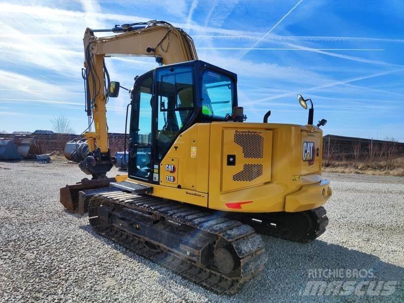 CAT 310-07A Гусеничні екскаватори