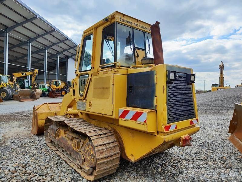 CAT 943 Гусеничні вантажники