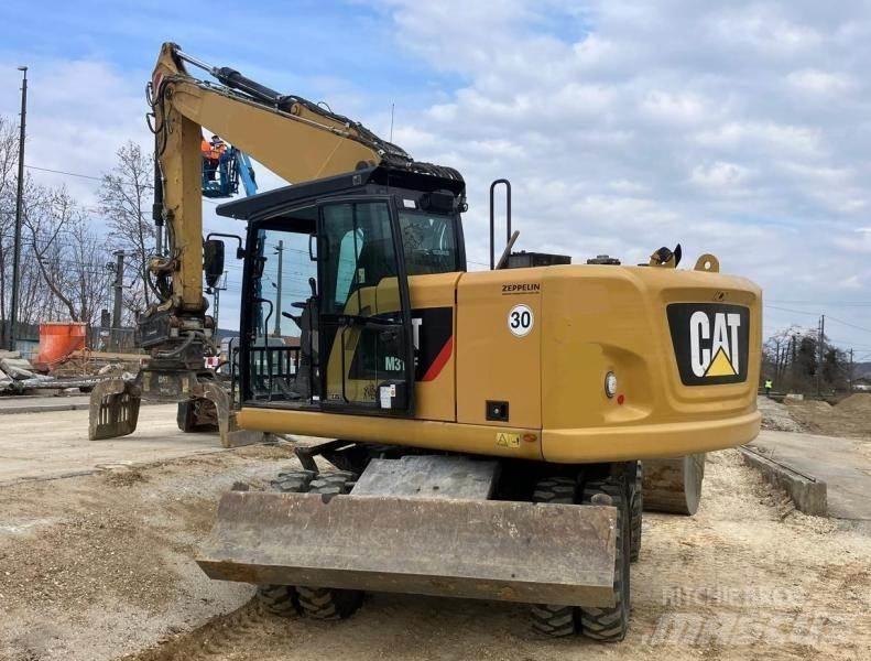 CAT M316F Колісні екскаватори