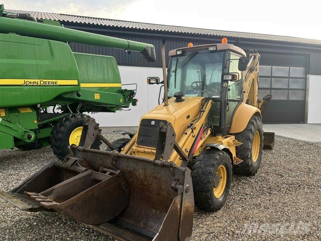 New Holland 675 E Екскаватори-навантажувачі