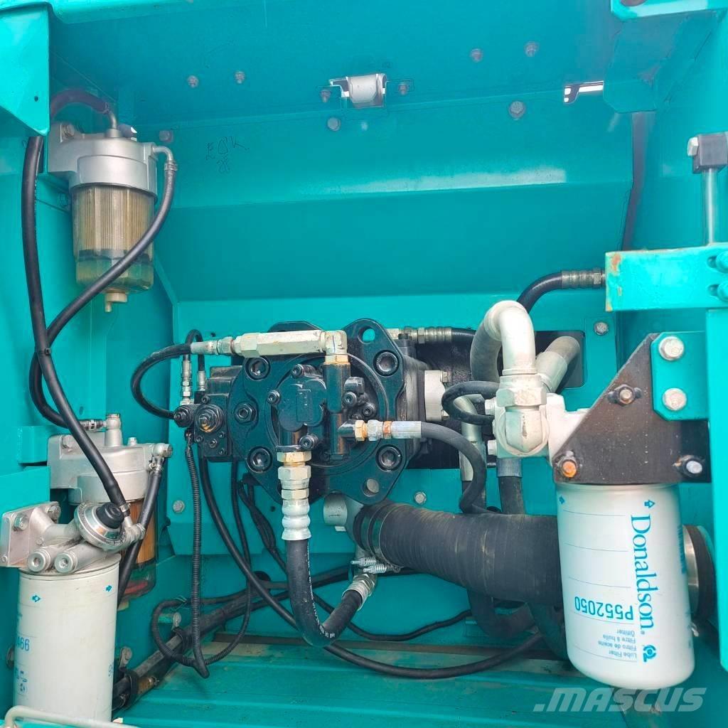 Kobelco SK 200 Гусеничні екскаватори