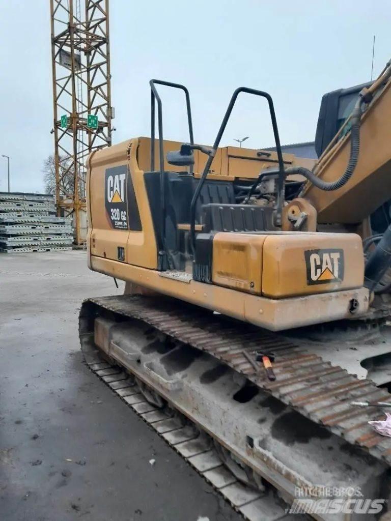 CAT 320 Гусеничні екскаватори