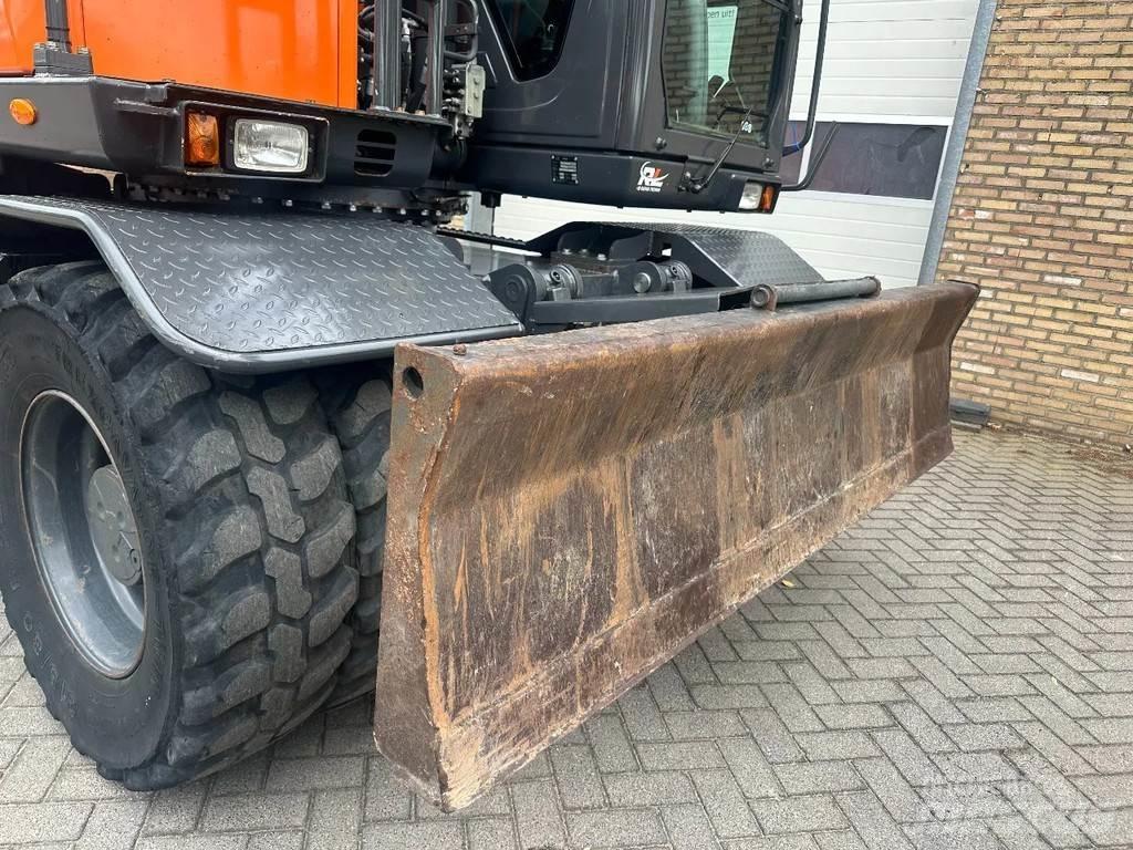 Doosan DX140W-5 Колісні екскаватори