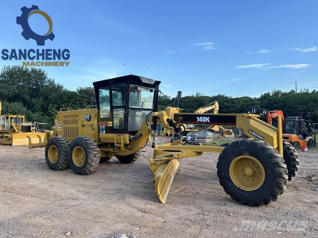 CAT 140K Грейдери