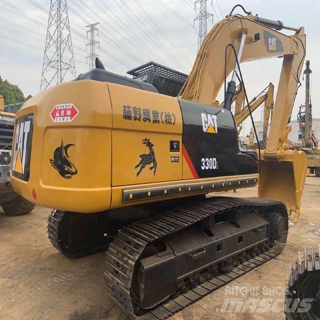 CAT 330DL Гусеничні екскаватори