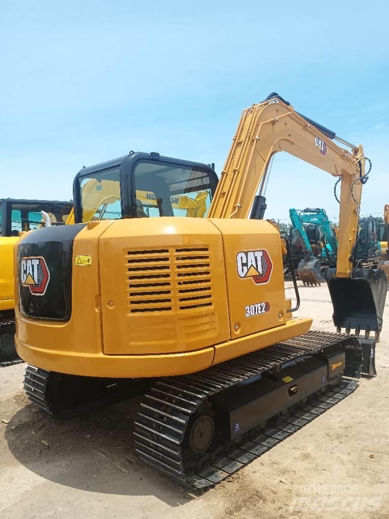 CAT 307E2 Середні екскаватори 7т. - 12т.