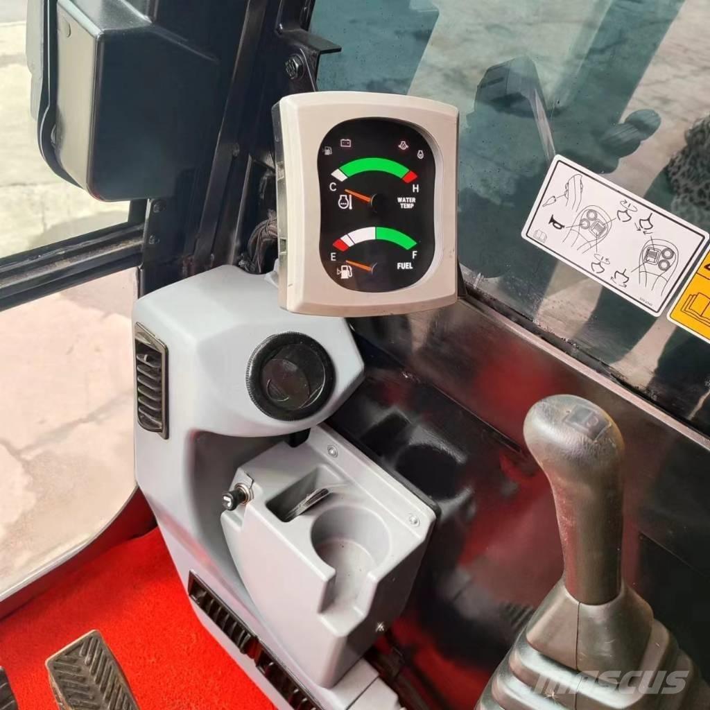 CAT 307E2 Телескопічні фронтальні навантажувачі