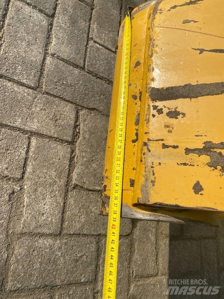 CAT Overslag arm Траншейні екскаватори
