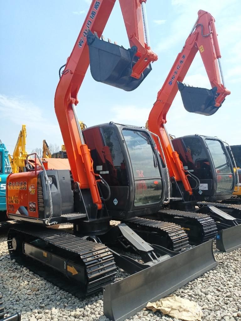 Hitachi ZX 70 Міні-екскаватори < 7т