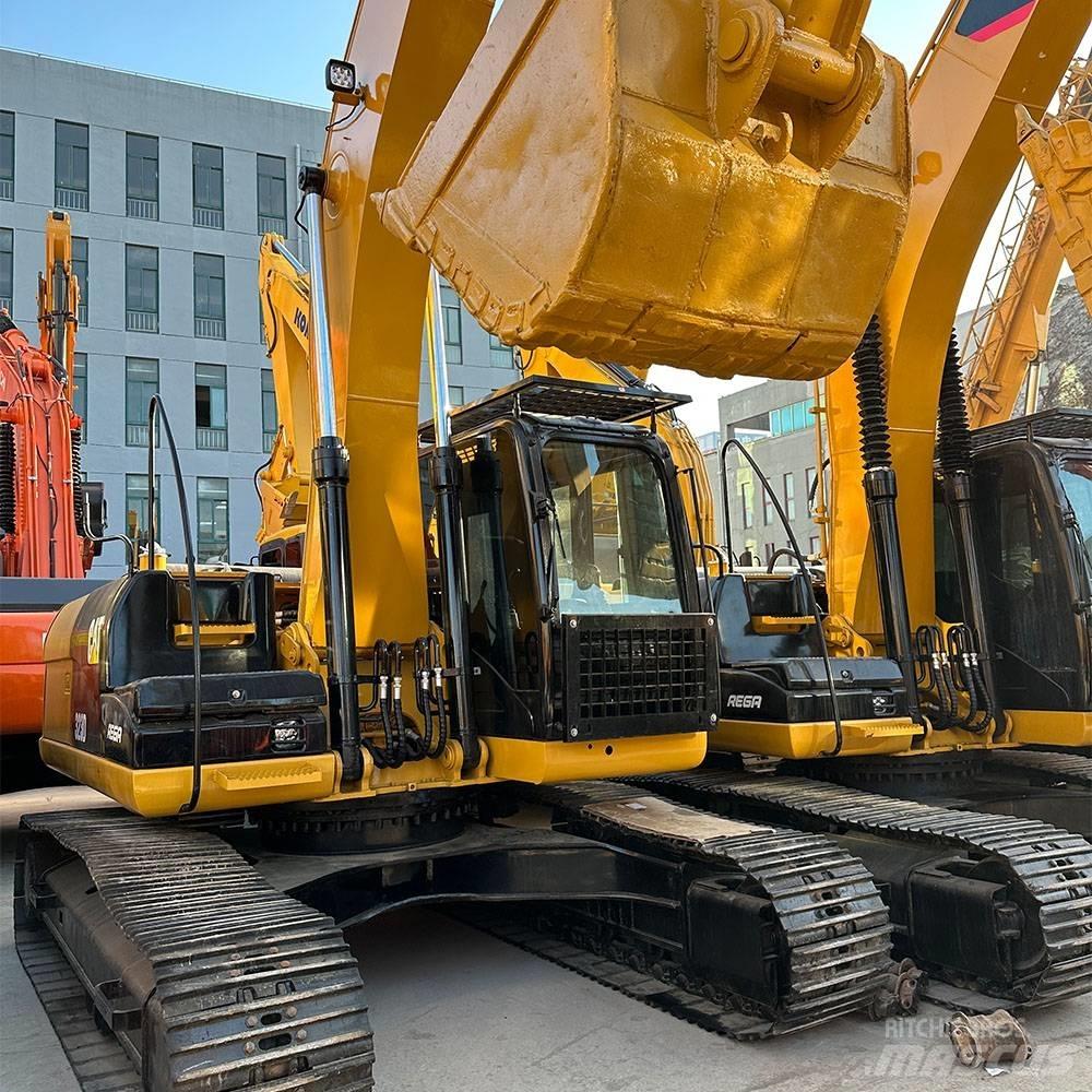 CAT 323 D Гусеничні екскаватори