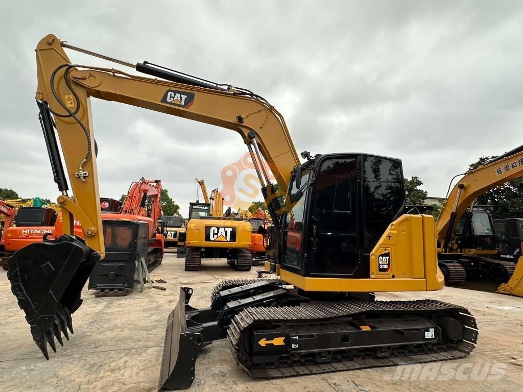 CAT 310 Гусеничні екскаватори
