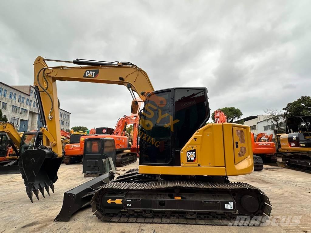CAT 310 Гусеничні екскаватори