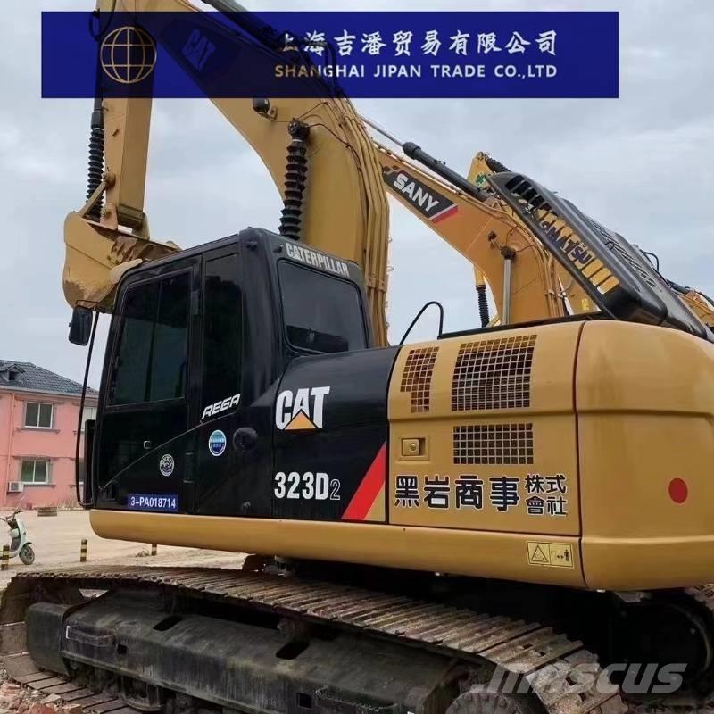 CAT 323 D Гусеничні екскаватори